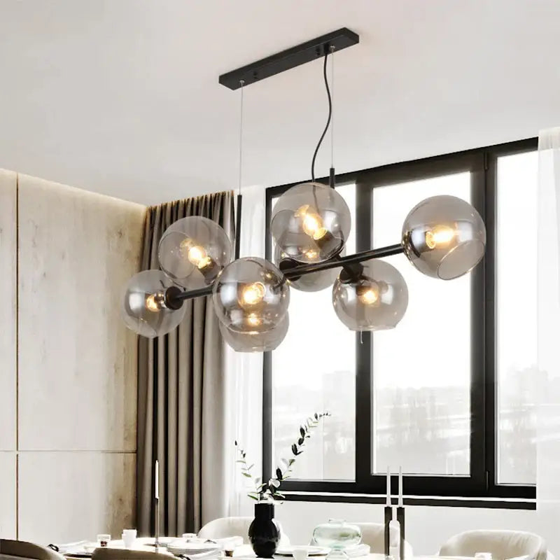 Modern brass and gray glass pendant lights for kitchen dining room