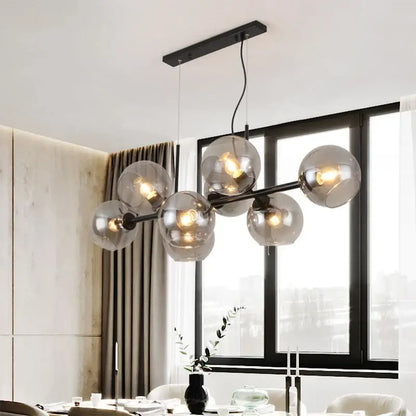 Modern brass and gray glass pendant lights for kitchen dining room