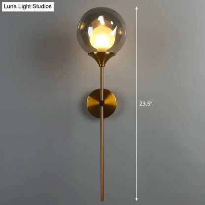 Modern brass and smoke gray glass wall light bedroom sconce