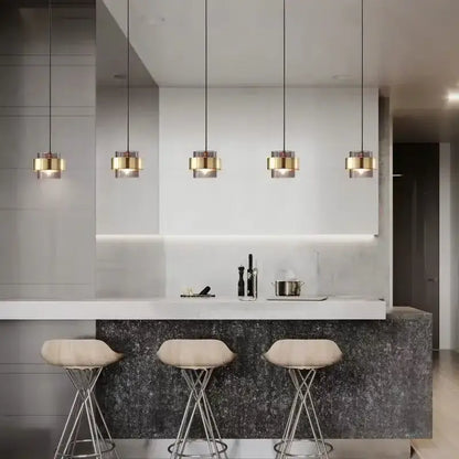 Modern brass and smoked glass pendant light dining room