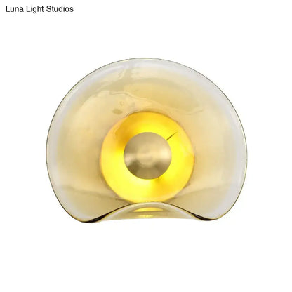 Modern brass and tan glass wall light fixture bedroom sconce