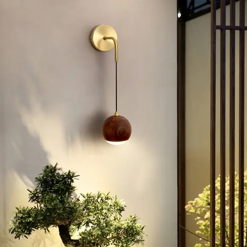 Modern brass and walnut wood wall sconce – bedroom sphere light