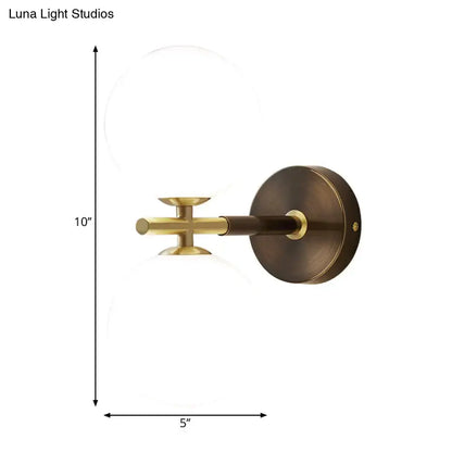 Modern brass and white glass wall sconce – bedroom globe light