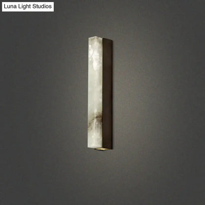 Modern brass and white onyx wall lighting – living room sconce