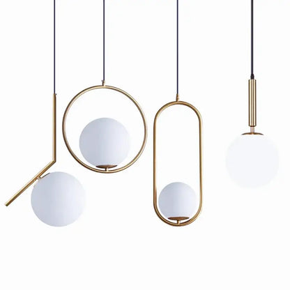 Modern brass & black glass ball pendant light dining room