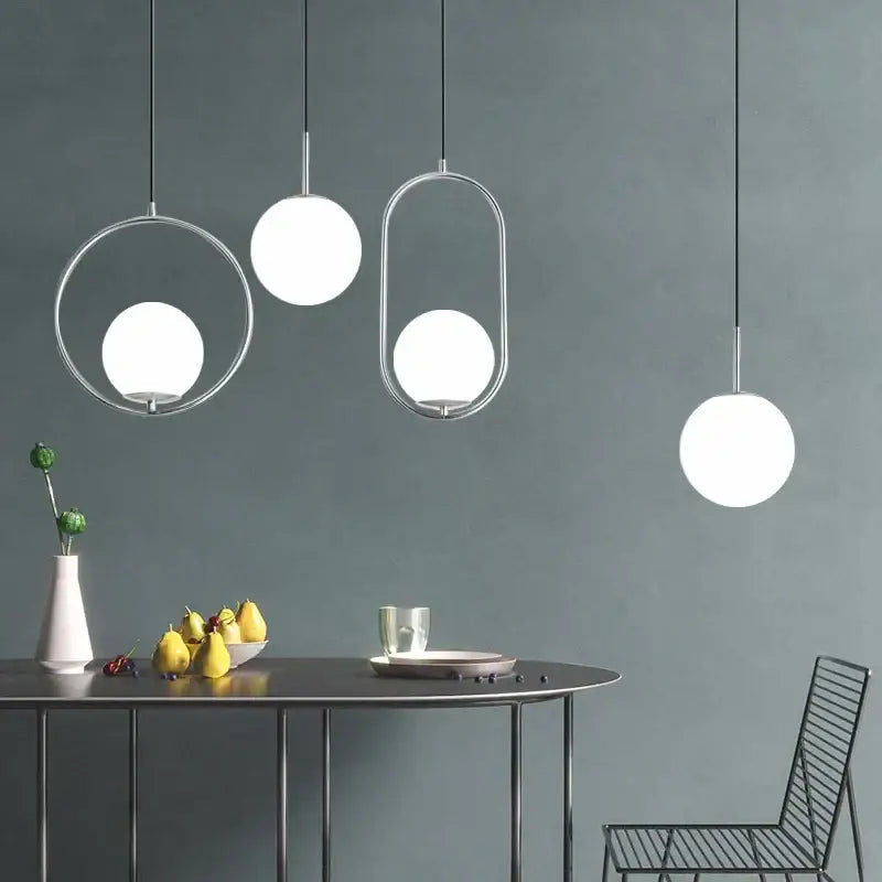 Modern brass & black glass ball pendant light dining room