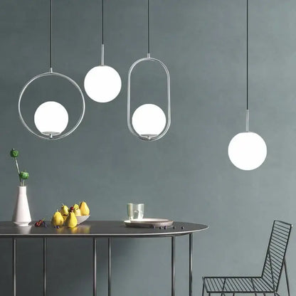 Modern brass & black glass ball pendant light dining room
