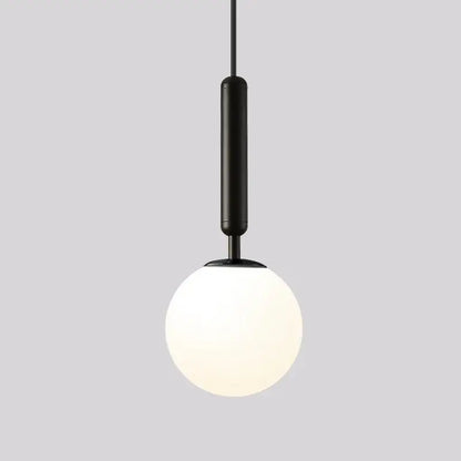Modern brass & black glass ball pendant light for dining room