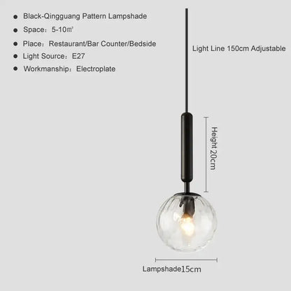 Modern brass & black glass ball pendant light for dining room