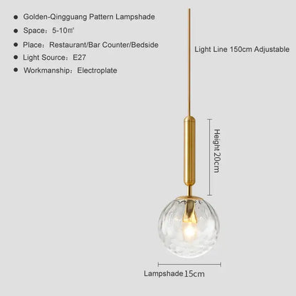 Modern brass & black glass ball pendant light for dining room