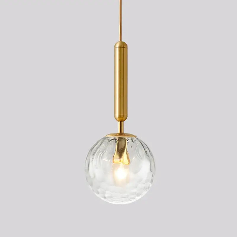 Modern brass & black glass ball pendant light for dining room