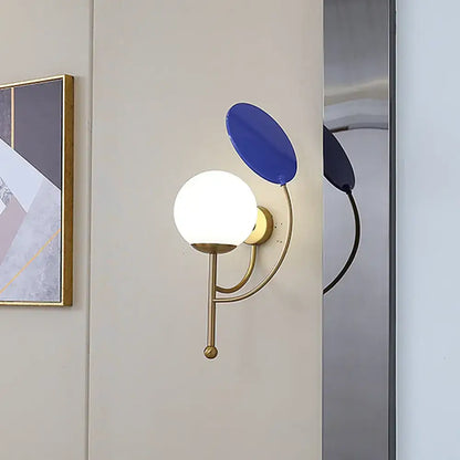 Modern brass & blue sconce bedroom light with white frosted glass