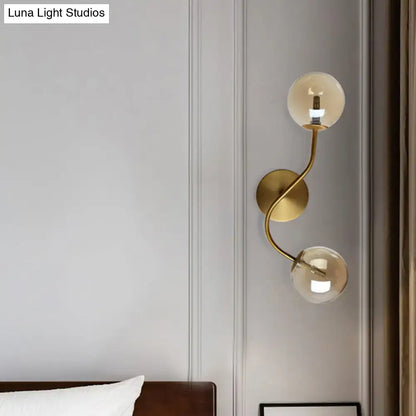 Modern brass clear tan glass wall lamp – stairway 2-light led