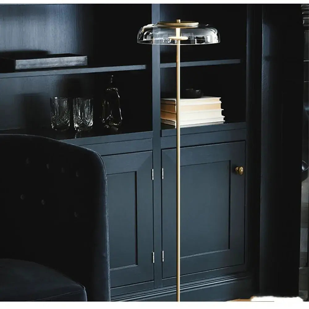 Modern brass floor lamp with glass lampshade for living room