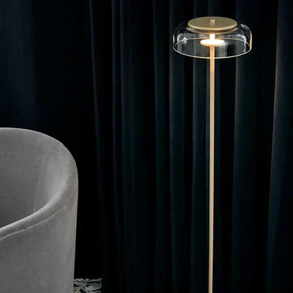 Modern brass floor lamp with glass lampshade for living room