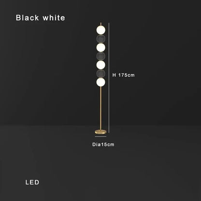 Modern brass floor lamp with six spheres for living room decor