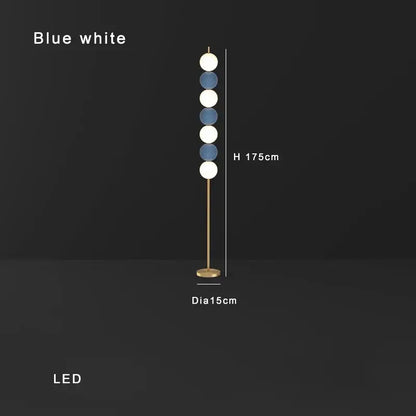 Modern brass floor lamp with six spheres for living room decor