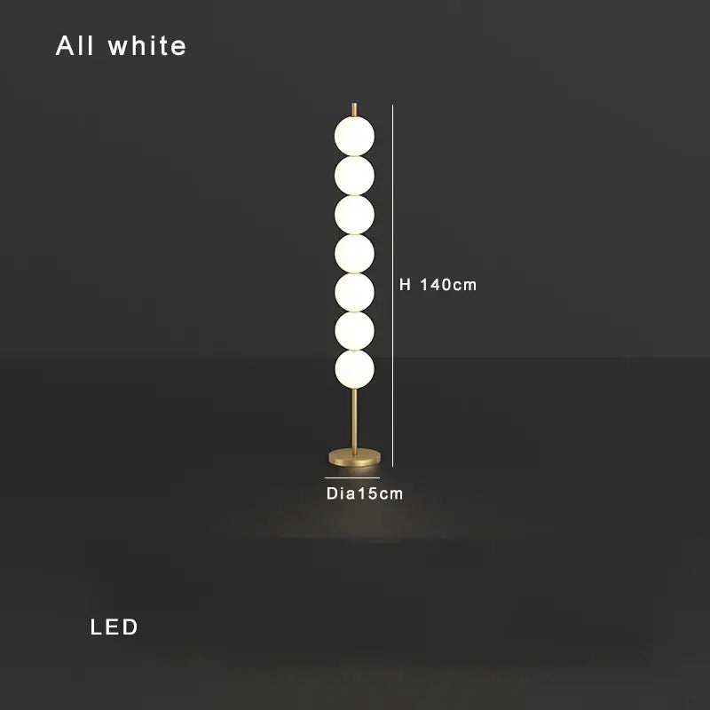 Modern brass floor lamp with six spheres for living room decor