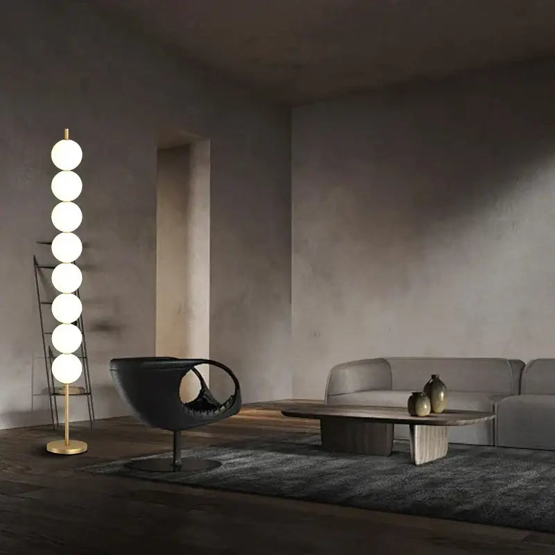 Modern brass floor lamp with six spheres for living room decor