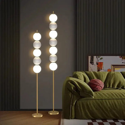 Modern brass floor lamp with six spheres for living room decor