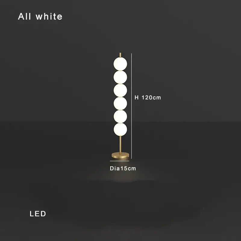 Modern brass floor lamp with six spheres for living room decor
