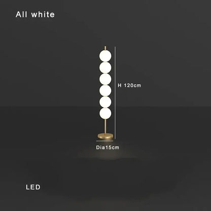 Modern brass floor lamp with six spheres for living room decor