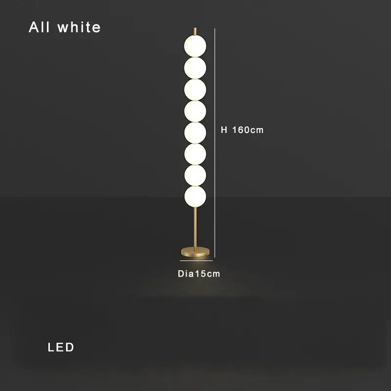 Modern brass floor lamp with six spheres for living room decor