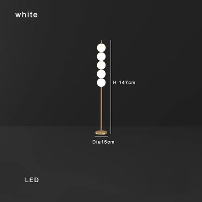 Modern brass floor lamp with six spheres for living room decor