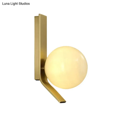 Modern brass frosted glass wall lamp for bedroom with curved backplate