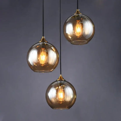 Modern brass glass ball pendant light dining and kitchen fixture