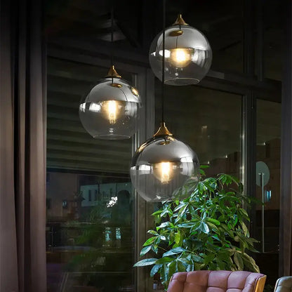 Modern brass glass ball pendant light dining and kitchen fixture