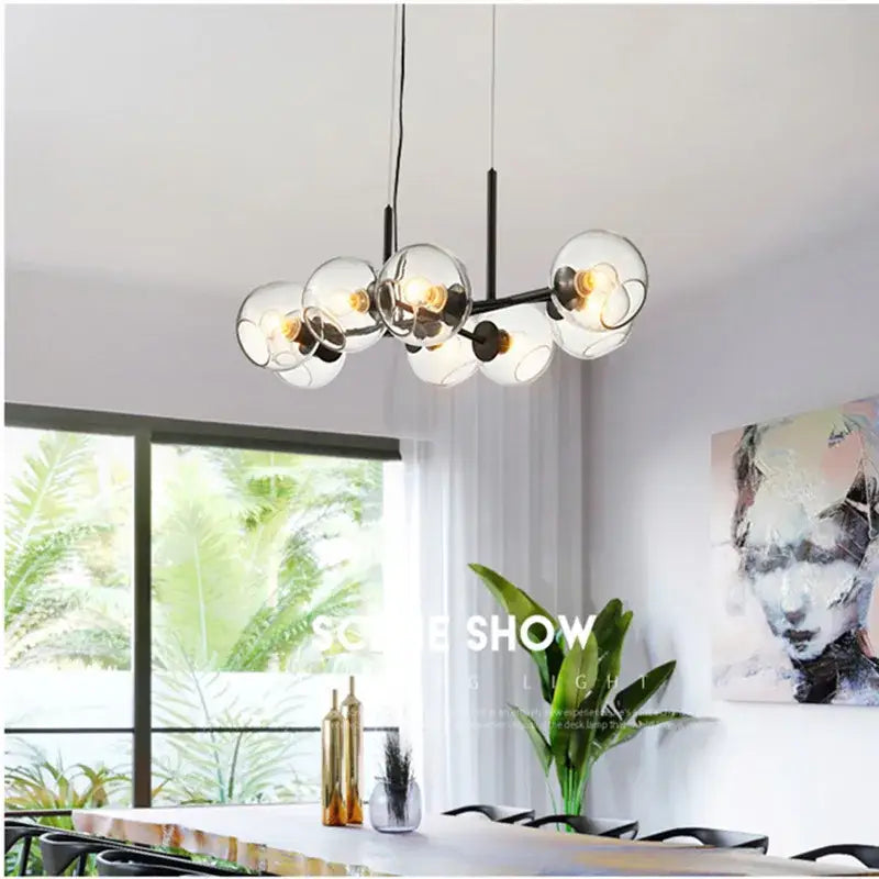Modern brass glass ball pendant light for kitchen decor