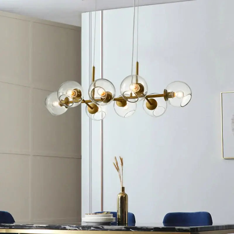 Modern brass glass ball pendant light for kitchen decor