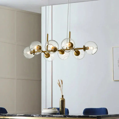 Modern brass glass ball pendant light for kitchen decor