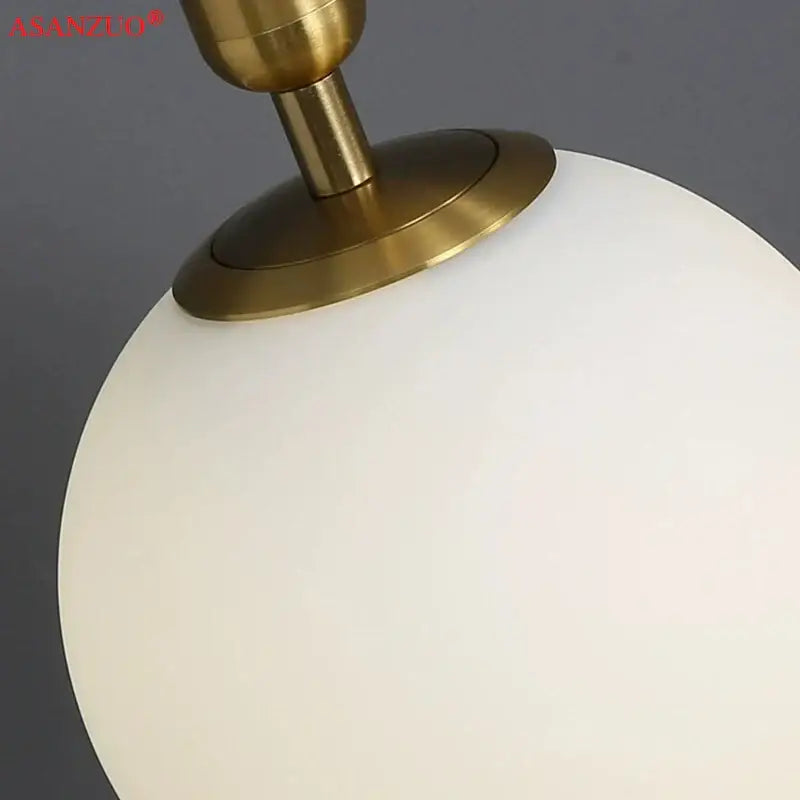 Modern brass glass ball pendant lights for kitchen decor