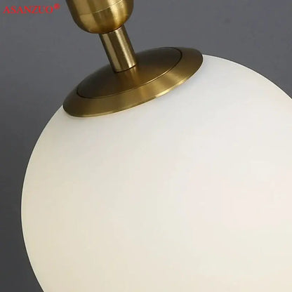 Modern brass glass ball pendant lights for kitchen decor