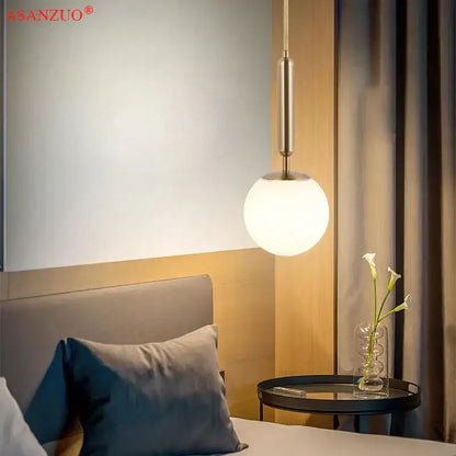 Modern brass glass ball pendant lights for kitchen decor