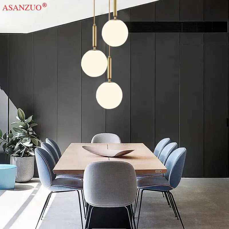 Modern brass glass ball pendant lights for kitchen decor