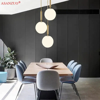 Modern brass glass ball pendant lights for kitchen decor