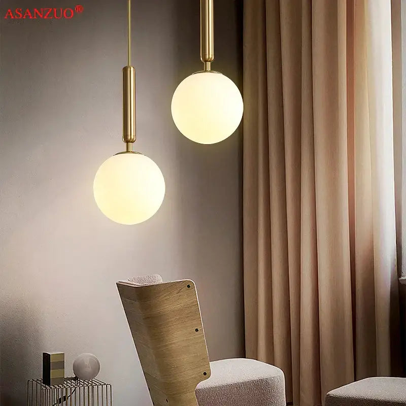 Modern brass glass ball pendant lights for kitchen decor