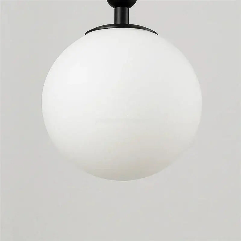 Modern brass glass ball wall lamp bedroom opaque & clear globe