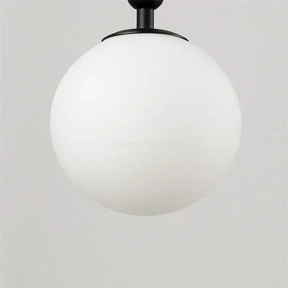Modern brass glass ball wall lamp bedroom opaque & clear globe