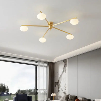 Modern brass glass ceiling lamp with frosted globes for living room