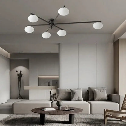 Modern brass glass ceiling lamp with frosted globes for living room