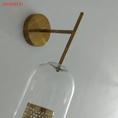 Modern brass glass wall lamp bedroom perforated gold sconce