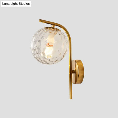 Modern brass globe bedside lamp with frosted glass for bedroom