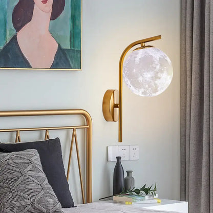 Modern brass globe bedside lamp with frosted glass for bedroom