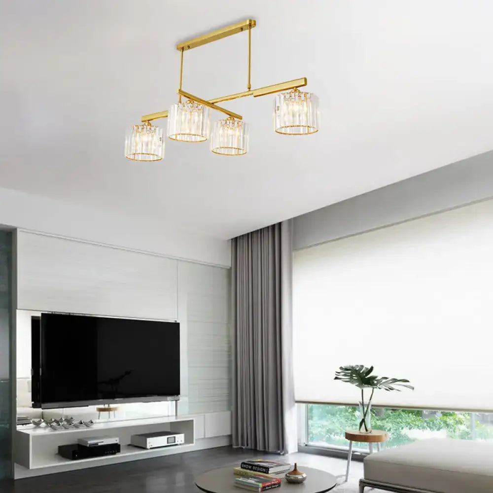 Modern brass hanging light with crystal shades – living room island