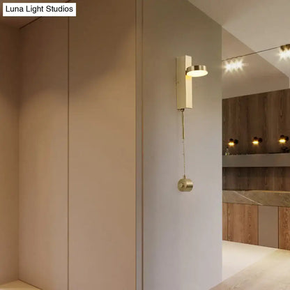 Modern brass l-shaped wall sconce with pull chain for living room