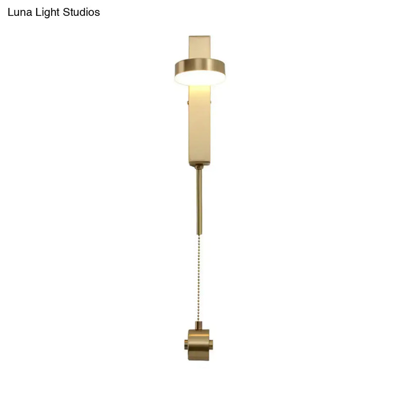 Modern brass l-shaped wall sconce with pull chain for living room